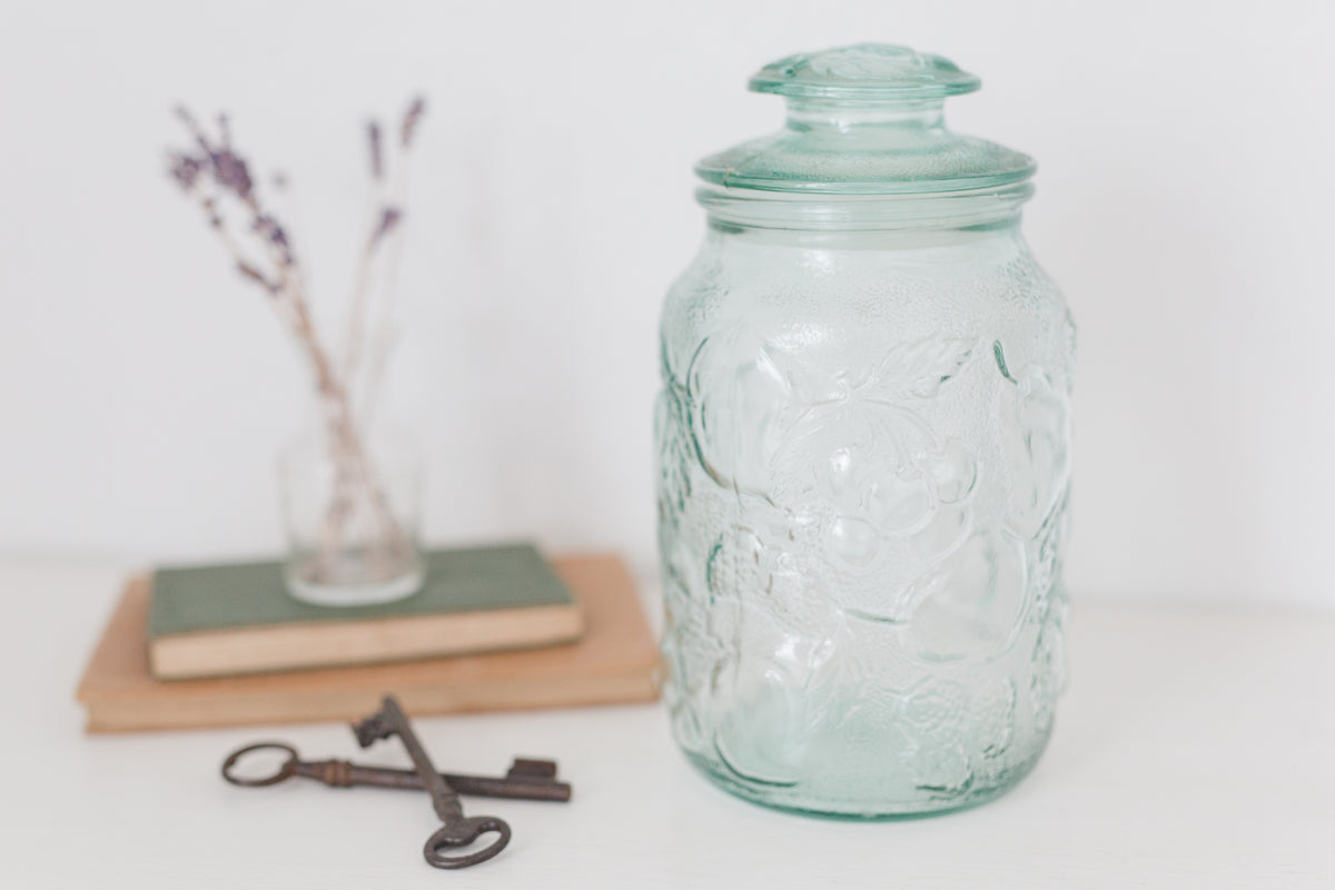 Vintage Embossed glass jar with lid