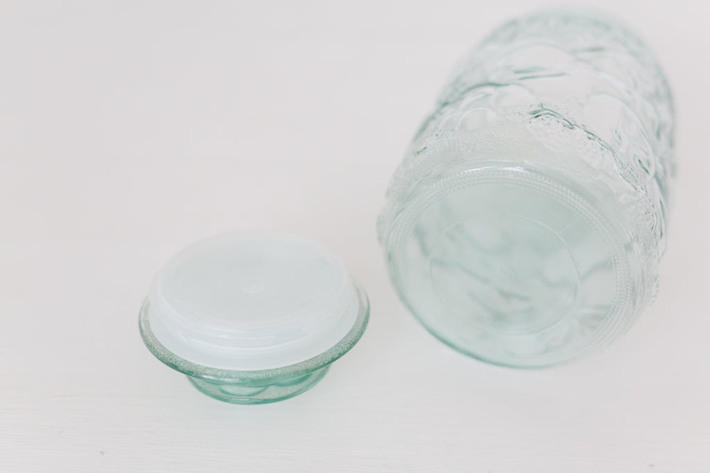 Vintage Embossed glass jar with lid
