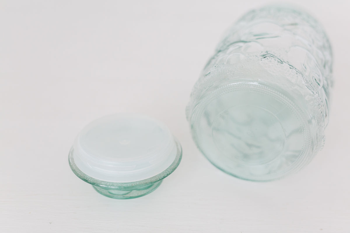 Vintage Embossed glass jar with lid