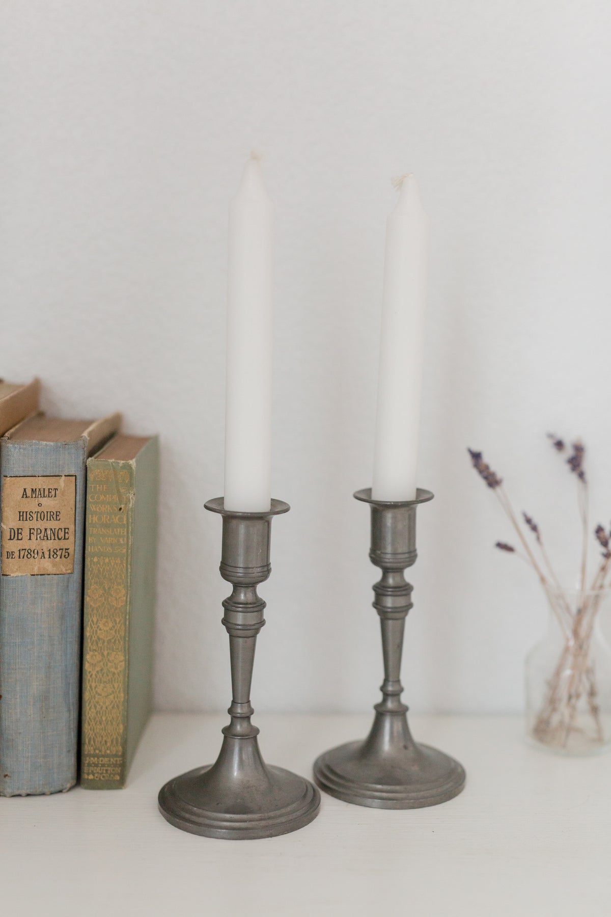 Vintage pair of pewter candle stick holders