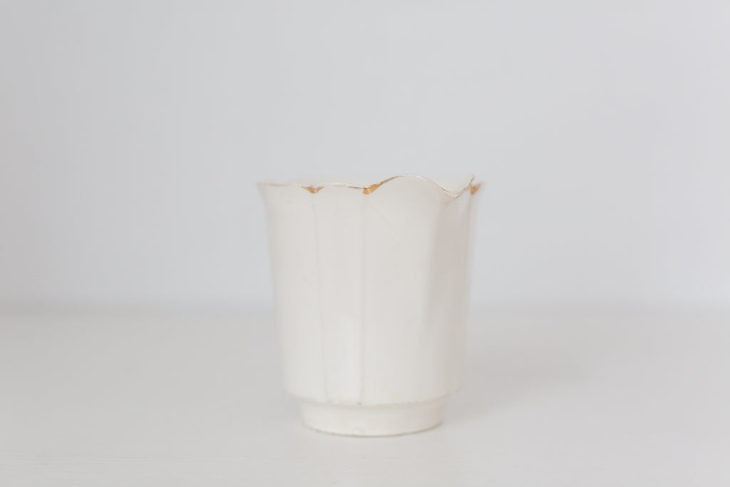 Vintage cream K T & K pitcher with gold accents