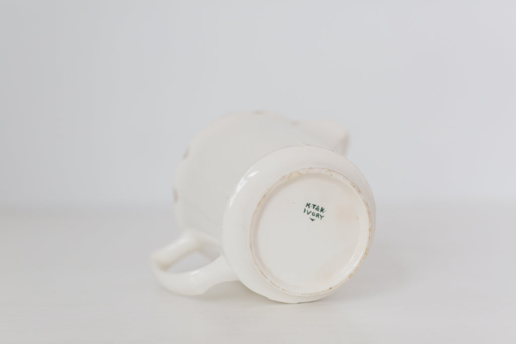 Vintage cream K T & K pitcher with gold accents