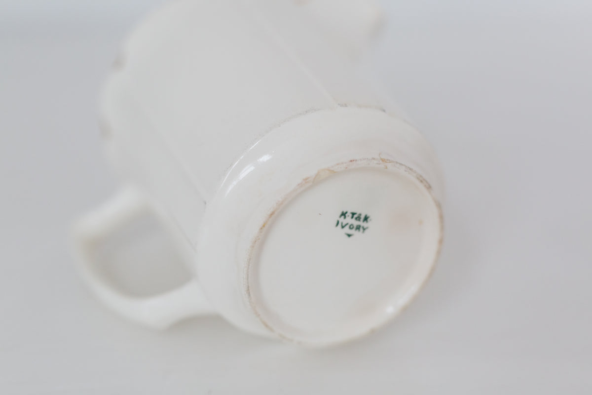 Vintage cream K T & K pitcher with gold accents