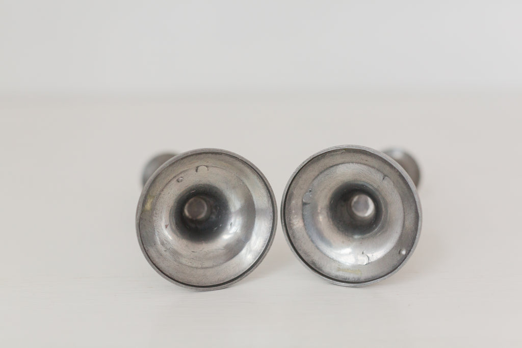 Vintage pair of pewter candle stick holders