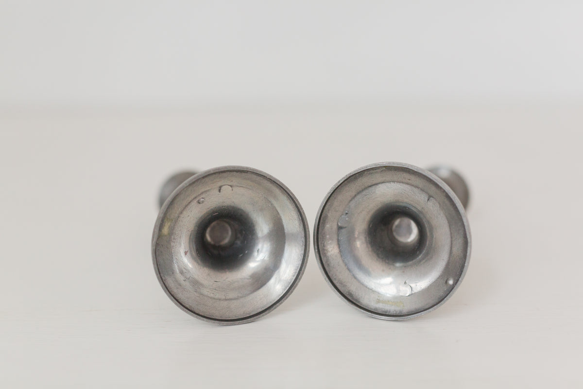 Vintage pair of pewter candle stick holders