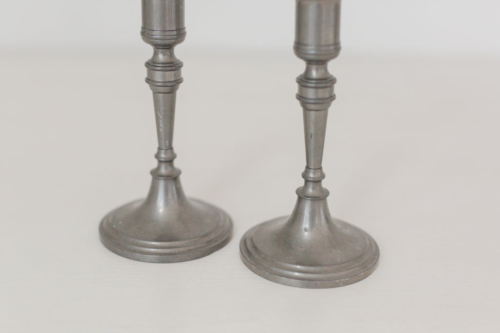 Vintage pair of pewter candle stick holders
