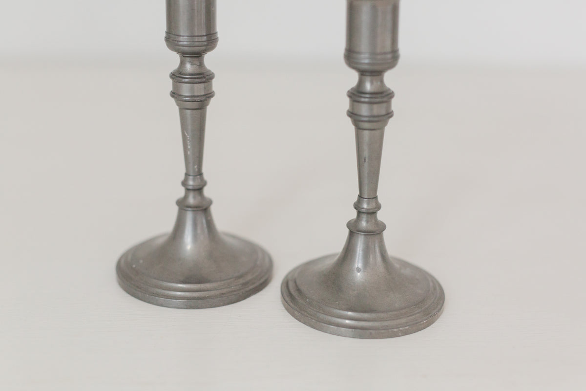 Vintage pair of pewter candle stick holders