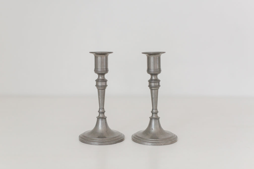 Vintage pair of pewter candle stick holders