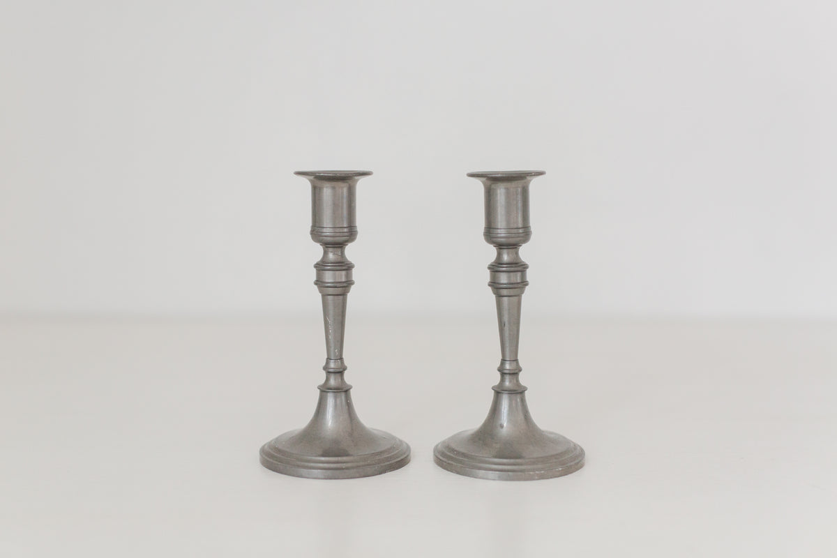 Vintage pair of pewter candle stick holders