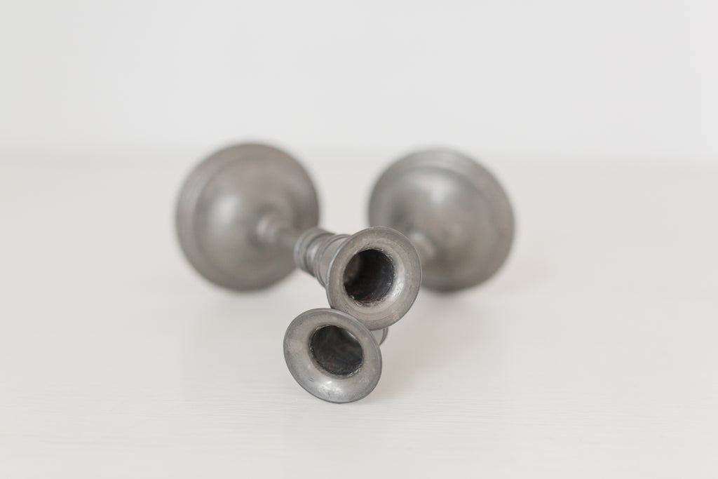Vintage pair of pewter candle stick holders