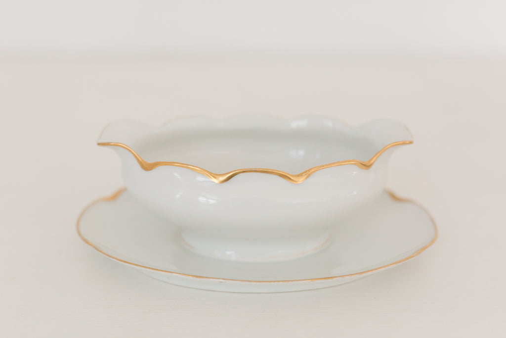 Vintage gravy boat with gold edging