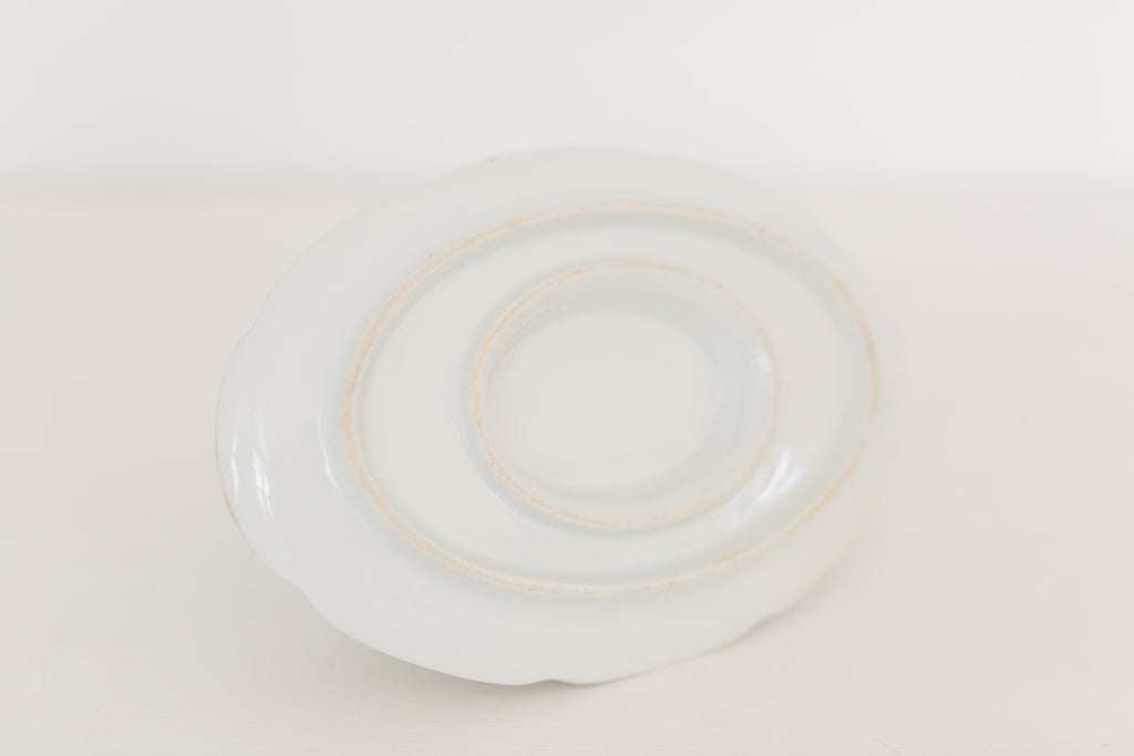 Vintage gravy boat with gold edging