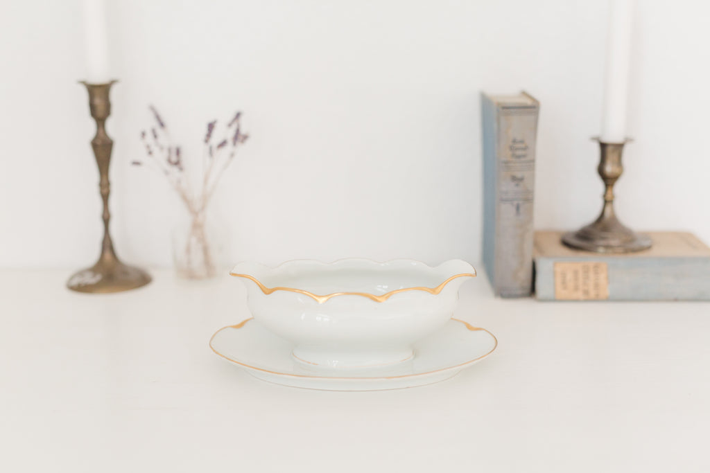 Vintage gravy boat with gold edging