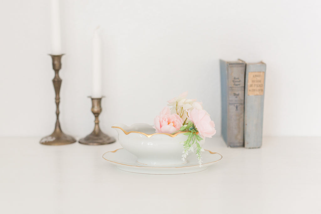 Vintage gravy boat with gold edging