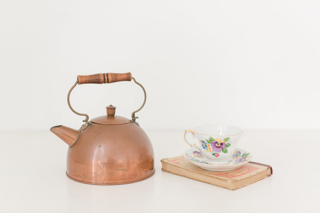 Vintage hand painted floral tea cup and saucer