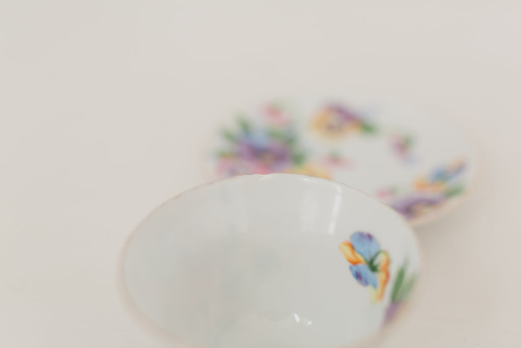 Vintage hand painted floral tea cup and saucer